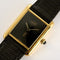 Cartier Tank Must - Montre grand modèle en argent plaqué or, cadran Onyx 58 Facettes A1217