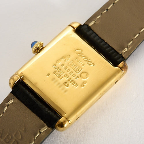 Cartier Tank Must - Montre grand modèle en argent plaqué or, cadran Onyx 58 Facettes A1217
