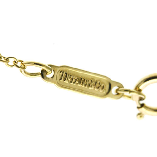 Tiffany & Co. Etoile - Pendentif en or jaune, platine et diamants 58 Facettes pnh7757a3b