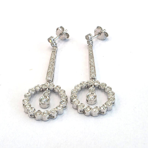 Boucles d'oreilles en or blanc 18 ct et diamants 58 Facettes 494/26 D
