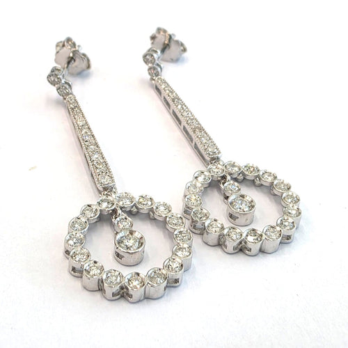 Boucles d'oreilles en or blanc 18 ct et diamants 58 Facettes 494/26 D