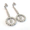 Boucles d'oreilles en or blanc 18 ct et diamants 58 Facettes 494/26 D