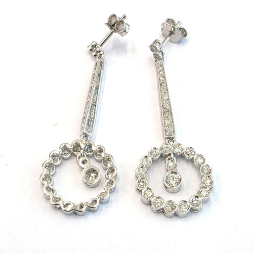 Boucles d'oreilles en or blanc 18 ct et diamants 58 Facettes 494/26 D