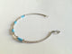 Bracelet en or blanc et turquoises 58 Facettes 01089