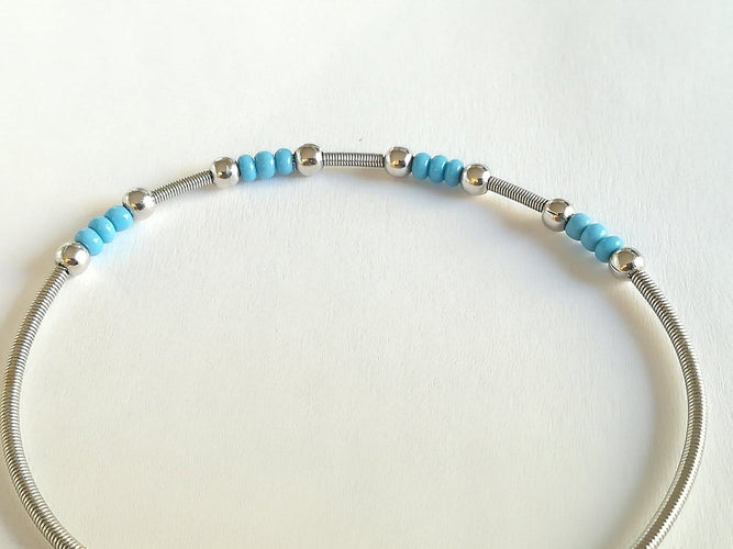 Bracelet en or blanc et turquoises 58 Facettes 01089
