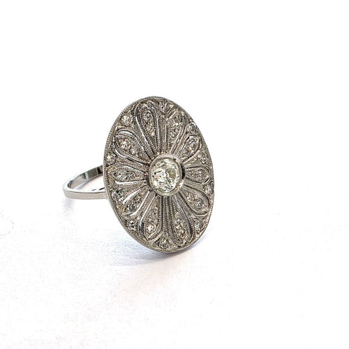 53 Bague en platine et diamants 58 Facettes 103/26 i