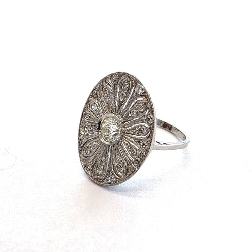 53 Bague en platine et diamants 58 Facettes 103/26 i