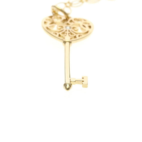Pendentif Tiffany & Co. - Pendentif Enchant Heart Key en or jaune et diamant 58 Facettes hz7be8pvk9