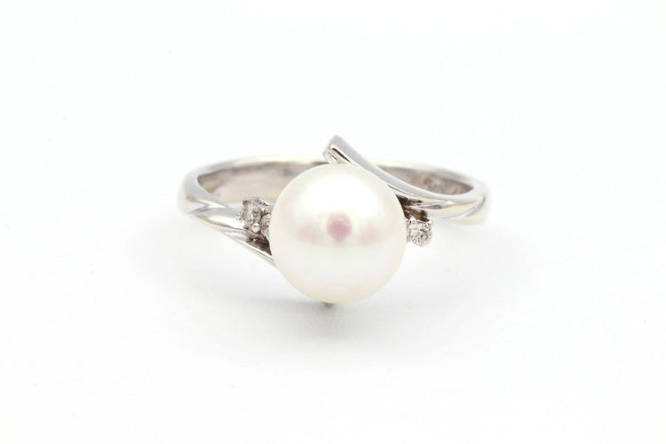 Bague 52 Années 70 - Bague en or blanc, perle et diamants 58 Facettes 19113
