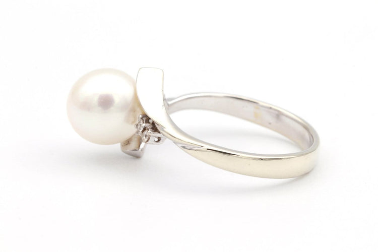 Bague 52 Années 70 - Bague en or blanc, perle et diamants 58 Facettes 19113
