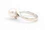 52 Années 70 - Bague en or blanc, perle et diamants 58 Facettes 19113