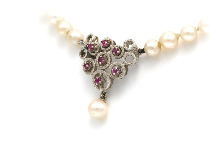Collier Collier années 70 en or blanc, perles et rubis 58 Facettes B278