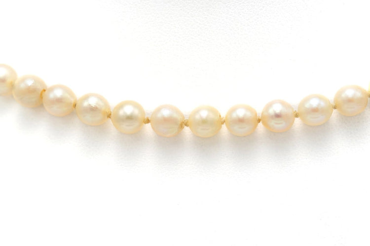 Collier Collier années 70 en or blanc, perles et rubis 58 Facettes B278