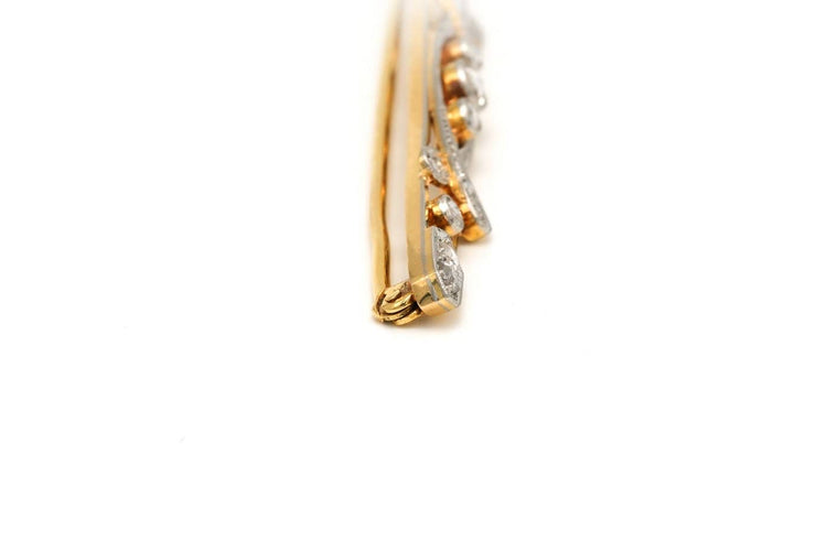Broche Broche Art déco en or blanc et jaune 18 carats sertie de diamants 58 Facettes 20675