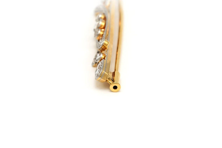 Broche Broche Art déco en or blanc et jaune 18 carats sertie de diamants 58 Facettes 20675