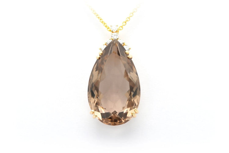 Pendentif Pendentif contemporain en or jaune 18 carats, quartz fumé et diamants taille brillant (0,36 ct) 58 Facettes 22322