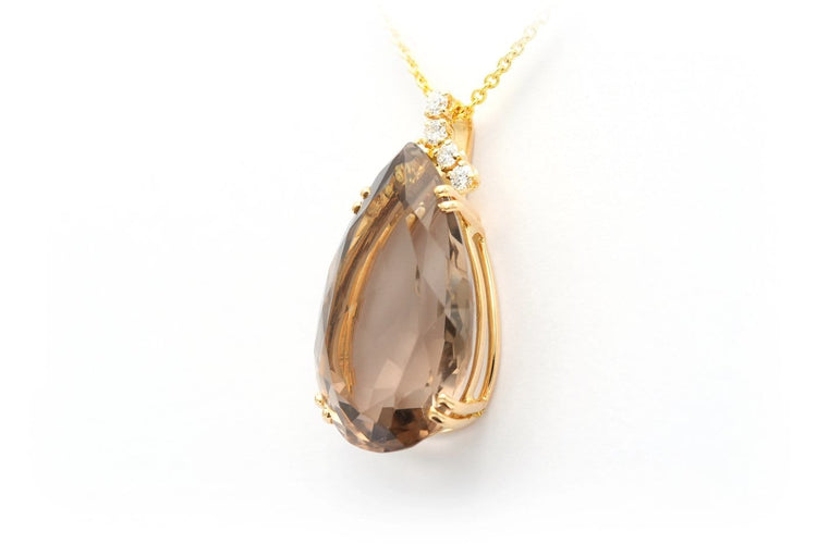 Pendentif Pendentif contemporain en or jaune 18 carats, quartz fumé et diamants taille brillant (0,36 ct) 58 Facettes 22322