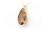 Pendentif Pendentif contemporain en or jaune 18 carats, quartz fumé et diamants taille brillant (0,36 ct) 58 Facettes 22322