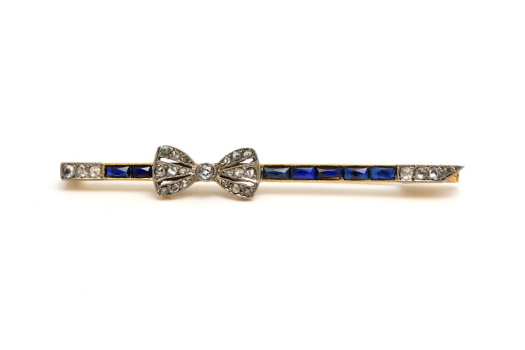 Broche Art déco en or jaune et blanc 18 carats, saphirs et diamants 58 Facettes 22536