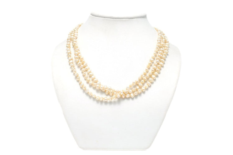Collier Années 70 - Collier en or blanc, perles et rubis 58 Facettes 22056