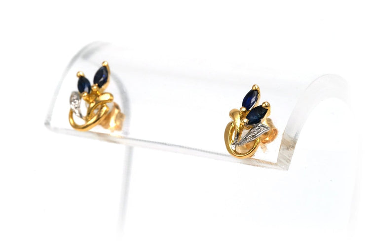 Boucles d'oreilles Boucles d'oreilles contemporaines en or jaune et blanc 18 carats et saphirs 58 Facettes 22580