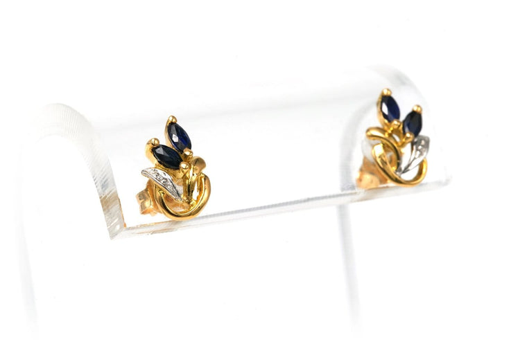 Boucles d'oreilles Boucles d'oreilles contemporaines en or jaune et blanc 18 carats et saphirs 58 Facettes 22580