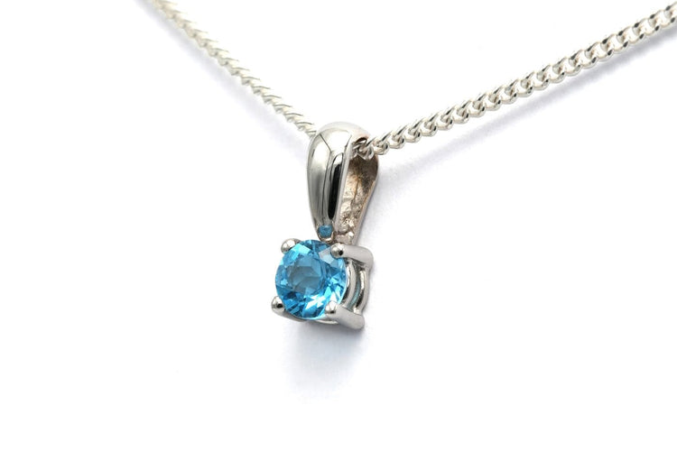 Pendentif contemporain en or blanc 18 carats et topaze 58 Facettes 22888