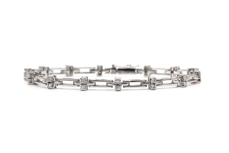 Bracelet contemporain en or blanc et diamants 58 Facettes B777