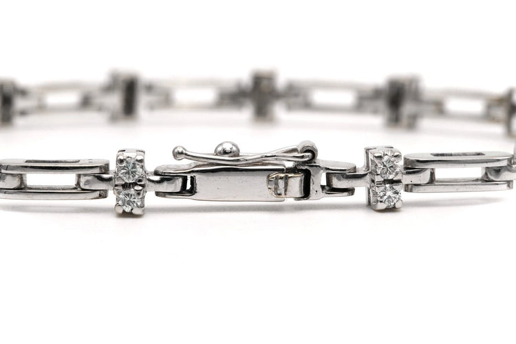 Bracelet contemporain en or blanc et diamants 58 Facettes B777