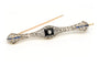 Broche Broche Art Déco en or jaune et blanc, onyx, saphirs et diamants 58 Facettes 23114