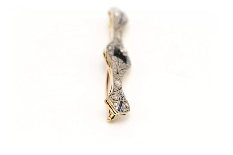 Broche Broche Art Déco en or jaune et blanc, onyx, saphirs et diamants 58 Facettes 23114