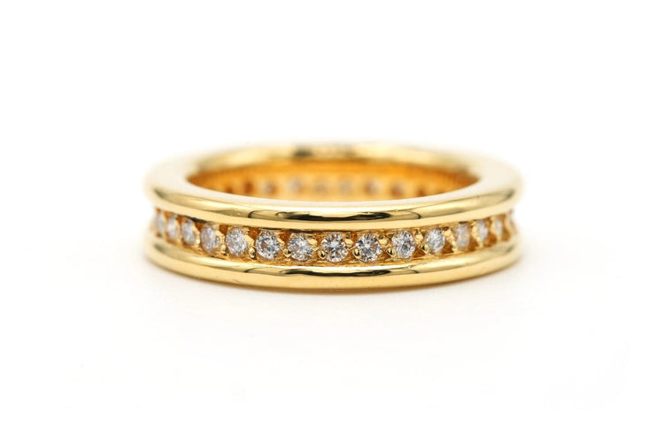 Bague 50 Bague contemporaine en or jaune 18 carats et diamants 58 Facettes 23256