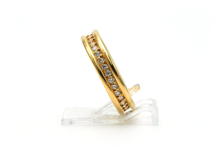 Bague 50 Bague contemporaine en or jaune 18 carats et diamants 58 Facettes 23256