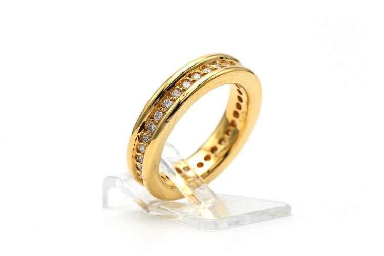 Bague 50 Bague contemporaine en or jaune 18 carats et diamants 58 Facettes 23256