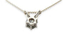 Pendentif Pendentif des années 70 en or blanc 18 carats, diamants taille baguette et diamant taille ancienne 58 Facettes 23415