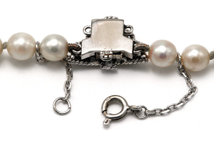Collier Années 50 - Collier de perles en or blanc et diamants 58 Facettes B850