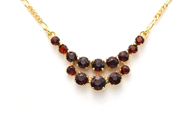 Collier Collier en or jaune 18 carats et grenats 58 Facettes 23840