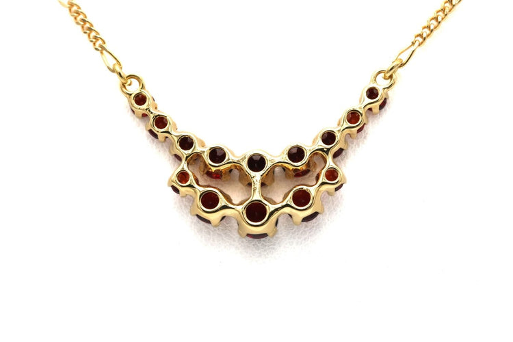 Collier Collier en or jaune 18 carats et grenats 58 Facettes 23840