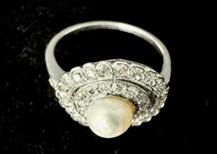 55 Art nouveau - Bague en platine, perle fine et diamants 58 Facettes Bague 23