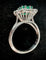 54 Bague marguerite en or blanc, émeraude et diamants 58 Facettes Bague 18