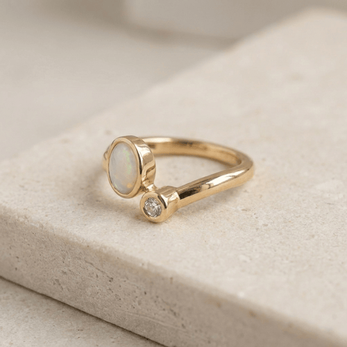 60 Toi-et-Moi - Bague en or jaune 585, opale et diamant 58 Facettes HJ062636