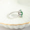 56 Bague fleur en or blanc 750 avec émeraudes et diamants 58 Facettes HJ062625