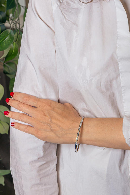 Bracelet jonc en or blanc et diamants 58 Facettes 5481003CN