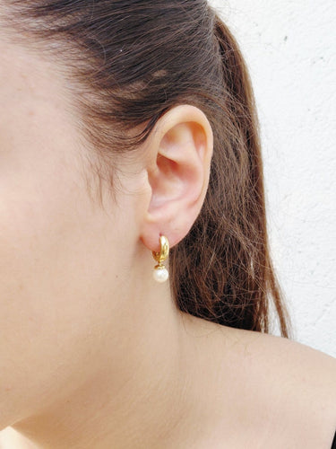 Boucles d'oreilles en or jaune et perles 58 Facettes 1808890