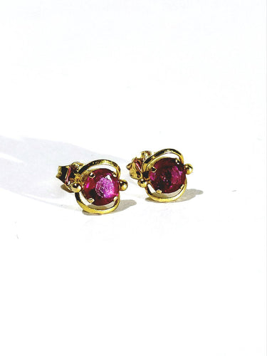 Boucles d'oreilles en or jaune et rubis 58 Facettes 1809238