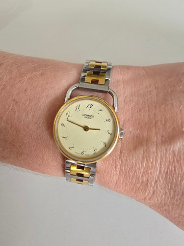 Hermès Arceau - Montre bicolore en acier et plaqué or jaune 58 Facettes Hermès Arceau