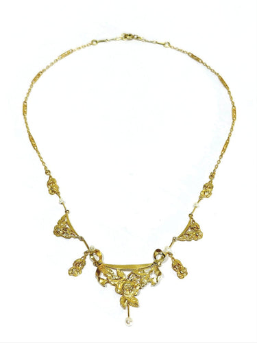 Collier drapé en or champagne et perles 58 Facettes 1809856