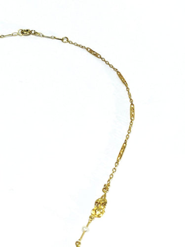 Collier drapé en or champagne et perles 58 Facettes 1809856