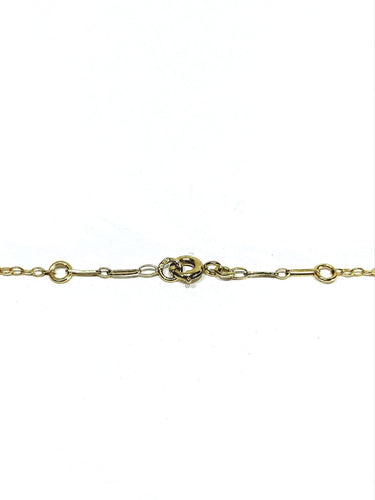 Collier drapé en or champagne et perles 58 Facettes 1809856