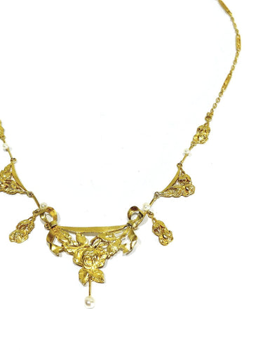 Collier drapé en or champagne et perles 58 Facettes 1809856